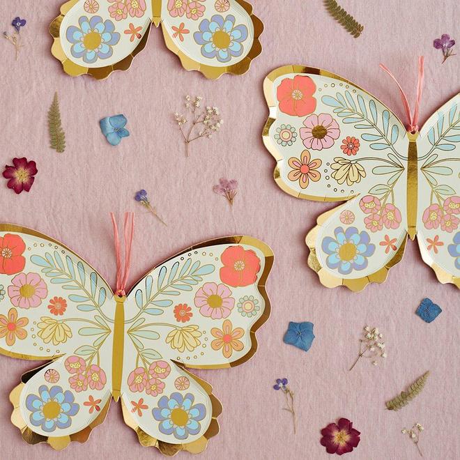 Platos con forma de mariposas florales